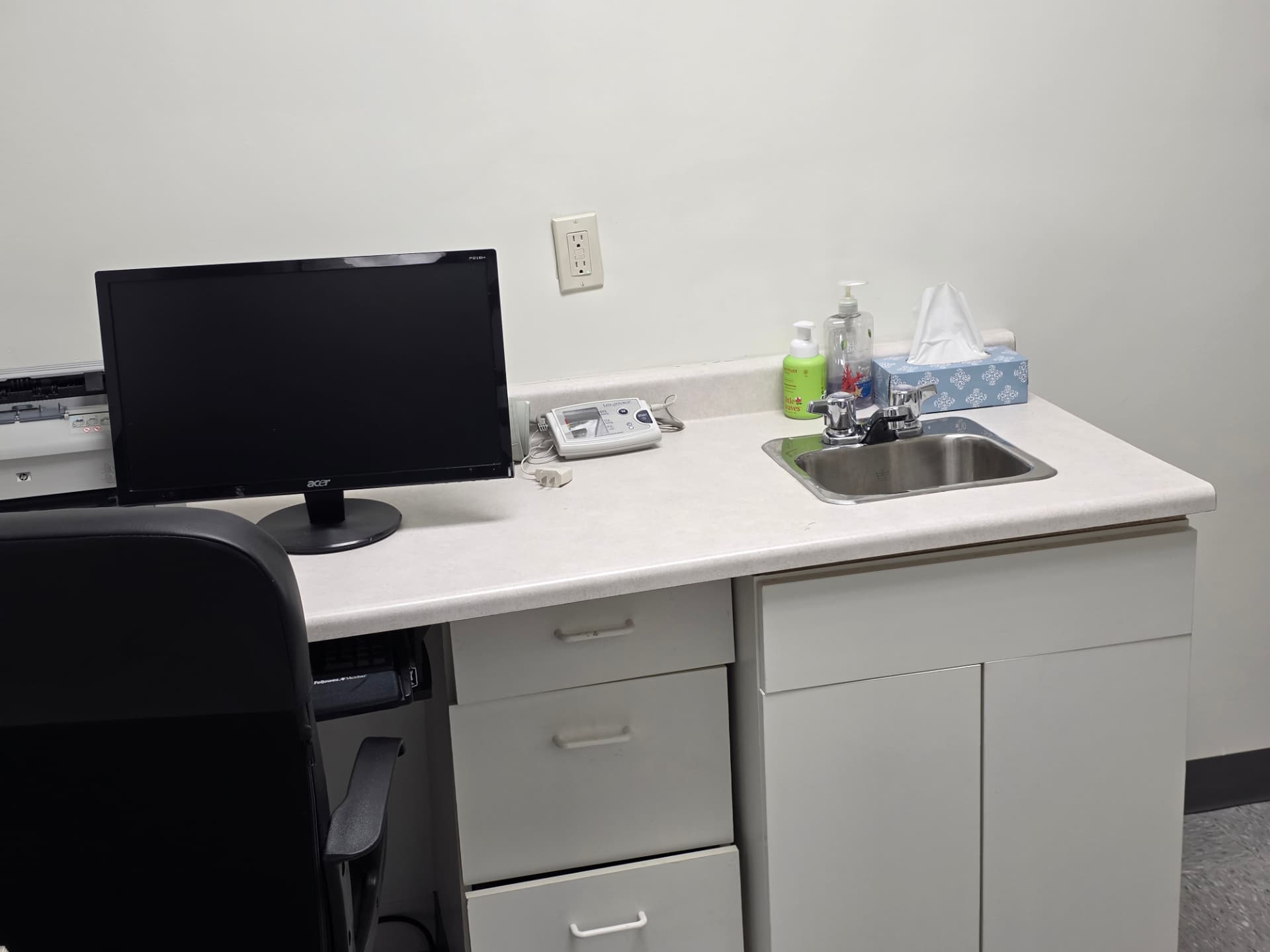 Clinical workstation with blood pressure machine and hand-washing station