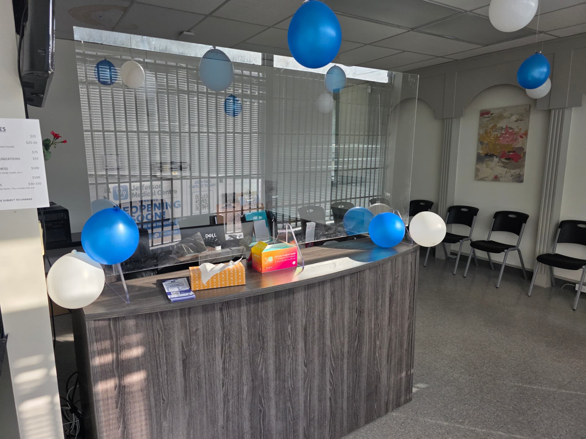 Front desk with protective screen and seating in the Jefferson Medical Centre waiting room