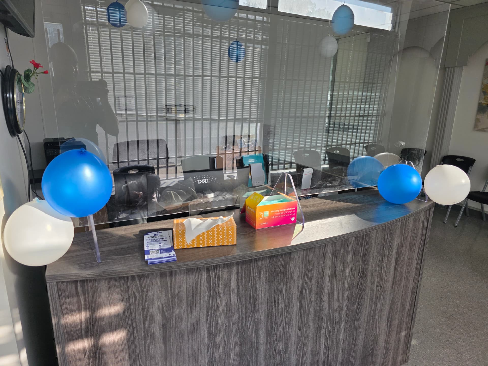 Reception counter with patient information leaflets at Jefferson Medical Centre