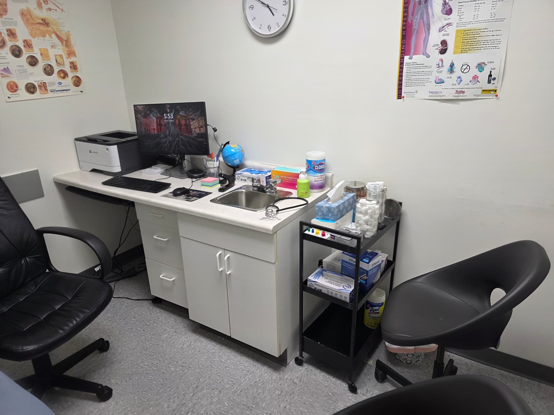 Examination room with clinical workstation and sink at Jefferson Medical Centre