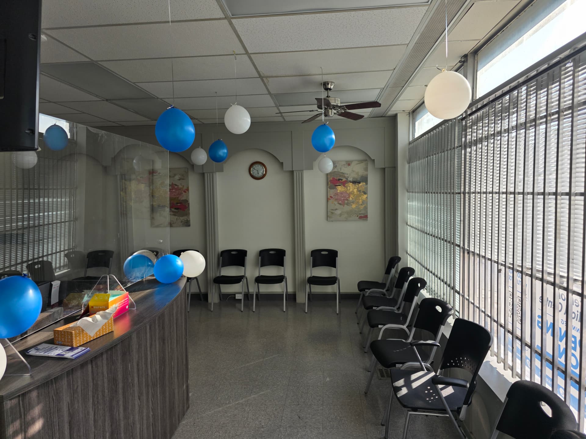 Bright reception and waiting area at Jefferson Medical Centre decorated for reopening day